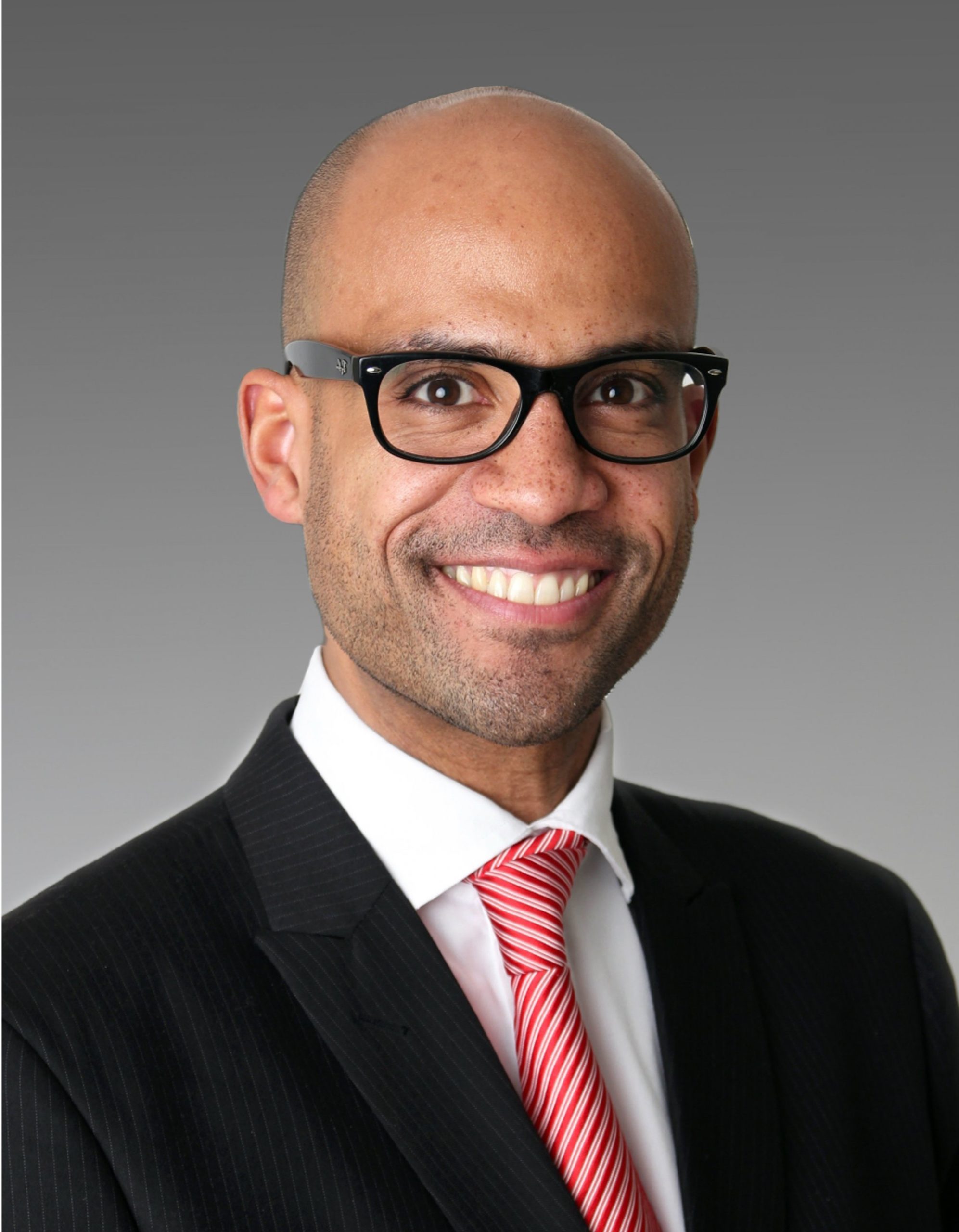 Denis Diop, Solicitor of England and Wales and member of the German Bar